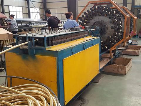 Steel wire spiral high pressure hose production.