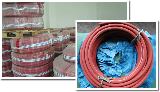 Several packed high pressure steam hoses in the warehouse and a detailed roll.